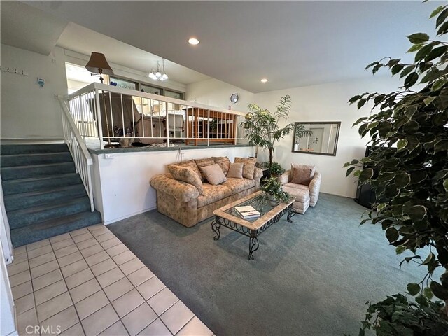 18405C Collins St Unit C, Tarzana, CA 91356 - living area with carpet, recessed lighting, tile patterned floors, stairway, and a chandelier