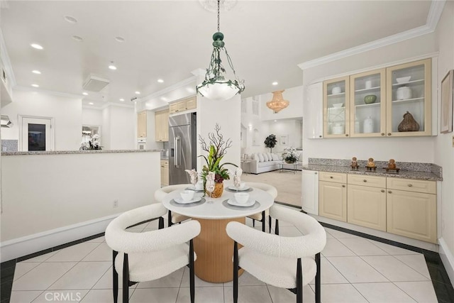 dining area with crown molding, recessed lighting, baseboards, and light tile patterned floors