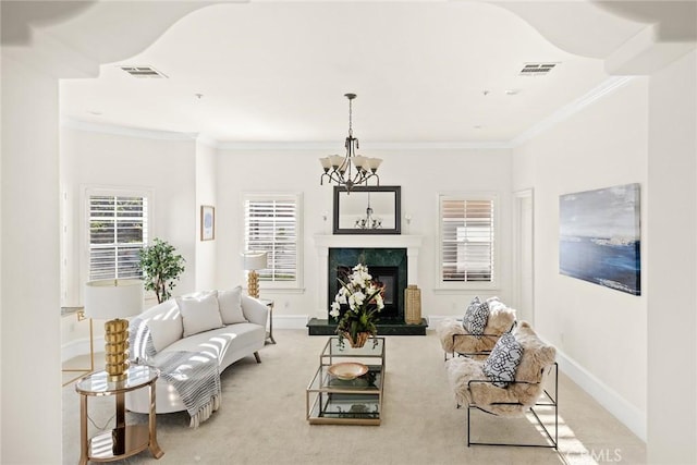 carpeted living area featuring visible vents, baseboards, crown molding, and an inviting chandelier