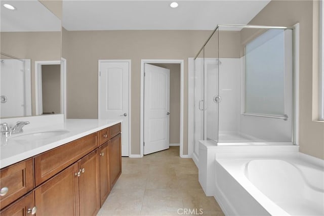 18870 Stetson St, Apple Valley, CA 92308 - bathroom with a shower stall, vanity, a garden tub, tile patterned floors, and recessed lighting