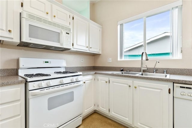 375 Partridge Ave, Paso Robles, CA 93446 - kitchen with white cabinetry, a sink, and white appliances