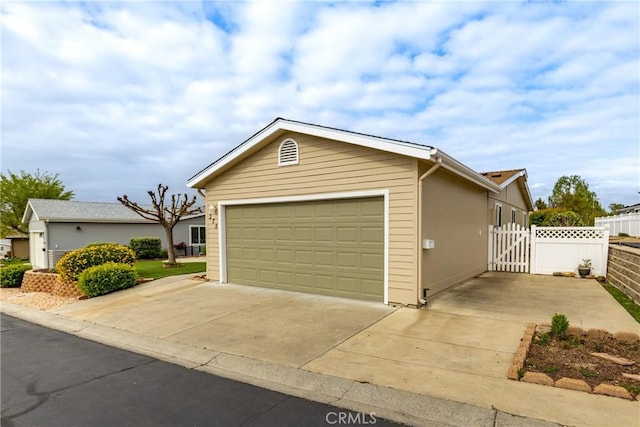 375 Partridge Ave, Paso Robles, CA 93446 - view of front facade with an attached garage, fence, and driveway
