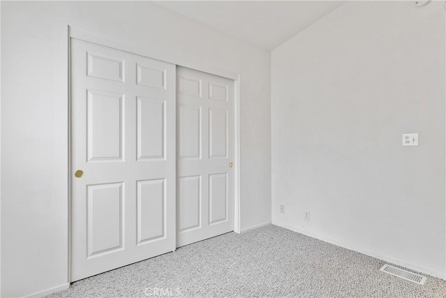 375 Partridge Ave, Paso Robles, CA 93446 - unfurnished bedroom featuring a closet, carpet, visible vents, and baseboards