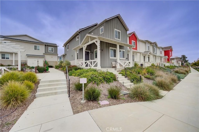 3860 Righetti Ranch Rd, San Luis Obispo, CA 93401 - view of front of property featuring board and batten siding, a residential view, and covered porch
