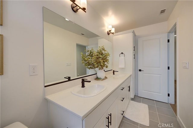 3860 Righetti Ranch Rd, San Luis Obispo, CA 93401 - full bathroom featuring double vanity, tile patterned flooring, and baseboards