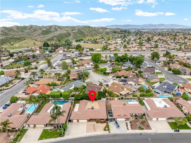 bird's eye view featuring a residential view and a mountain view