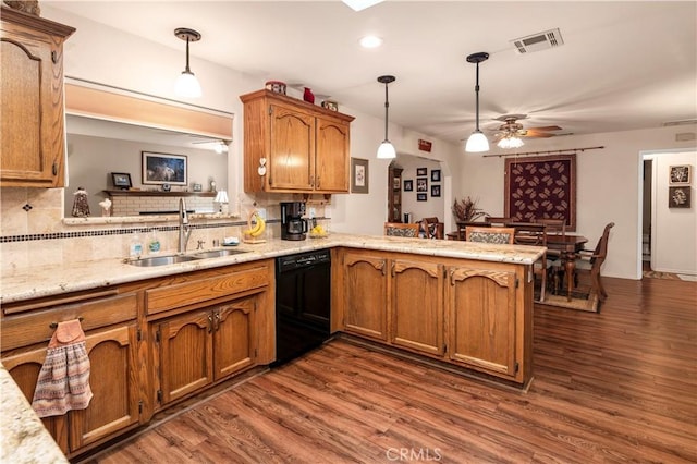 kitchen with dishwasher, ceiling fan, a sink, and visible vents