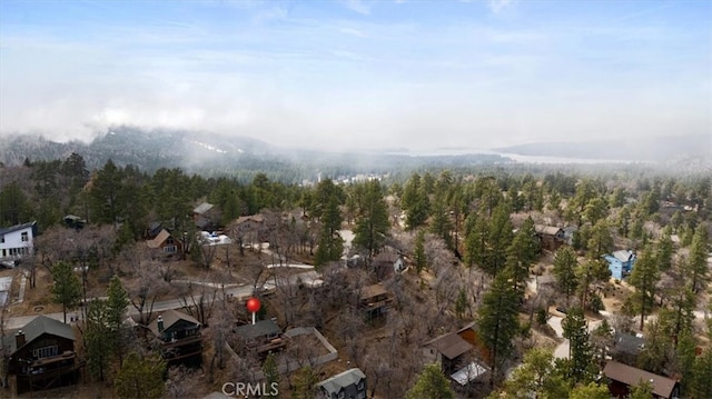 bird's eye view with a forest view and a residential view