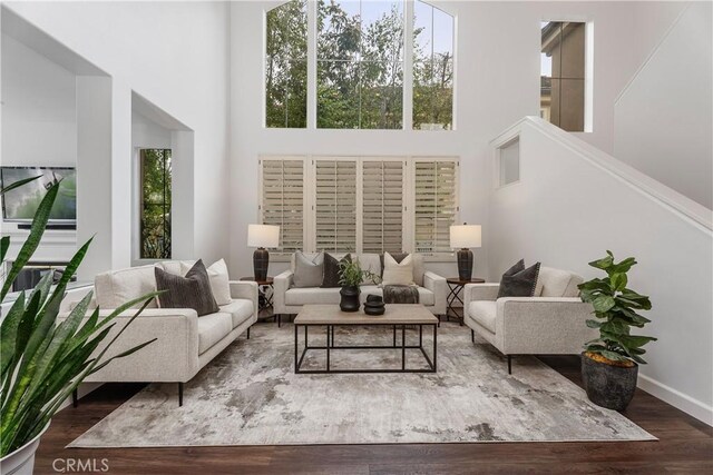 1 Giverny, Newport Coast, CA 92657 - living room with a high ceiling, wood finished floors, and healthy amount of natural light