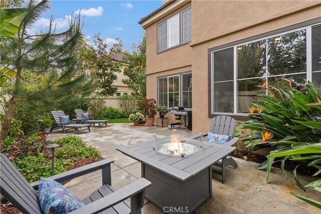 1 Giverny, Newport Coast, CA 92657 - view of patio featuring a fire pit