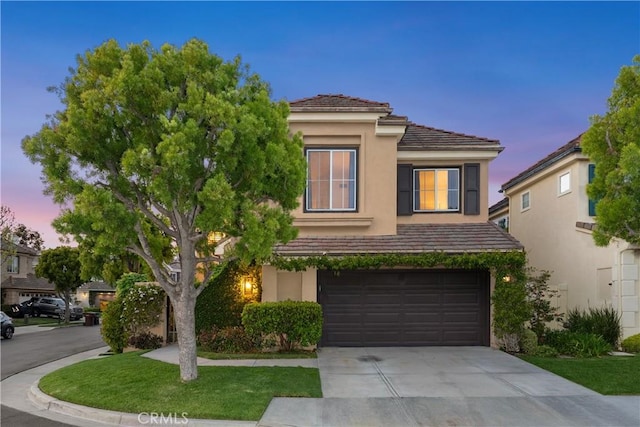 1 Giverny, Newport Coast, CA 92657 - traditional home featuring stucco siding, driveway, and a garage