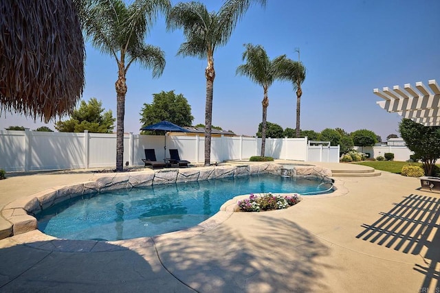 view of swimming pool with a patio area, a fenced in pool, and a fenced backyard