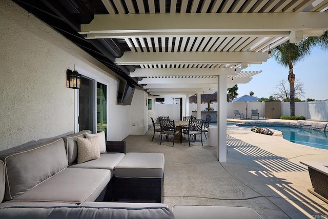 view of patio / terrace featuring an outdoor hangout area, outdoor dining space, a fenced in pool, and a fenced backyard