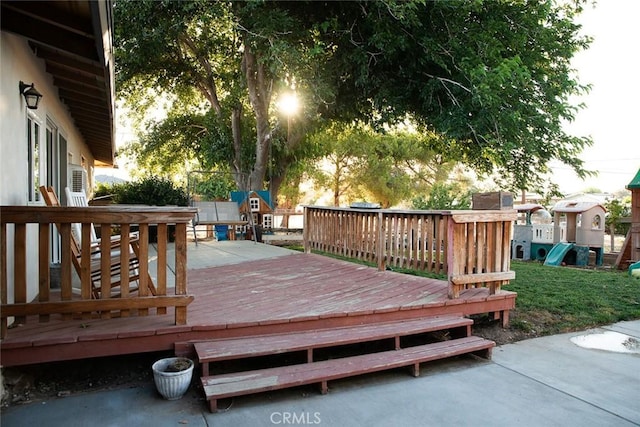 wooden deck with a playground