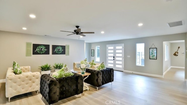 18971 Birch St, Perris, CA 92570 - living area featuring light wood-type flooring, baseboards, recessed lighting, and ceiling fan