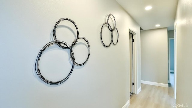 18971 Birch St, Perris, CA 92570 - corridor with recessed lighting, light wood-style flooring, and baseboards