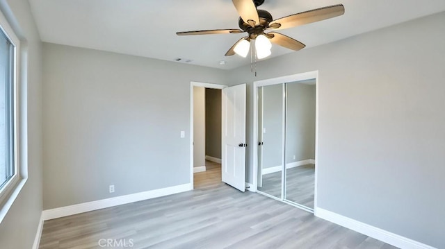 18971 Birch St, Perris, CA 92570 - unfurnished bedroom with a closet, baseboards, and wood finished floors