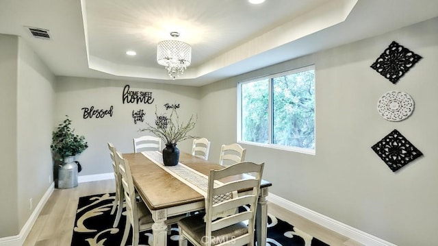 18971 Birch St, Perris, CA 92570 - dining space with a tray ceiling, light wood-style floors, baseboards, and recessed lighting