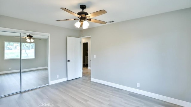 18971 Birch St, Perris, CA 92570 - unfurnished bedroom with light wood-type flooring, baseboards, a closet, and a ceiling fan