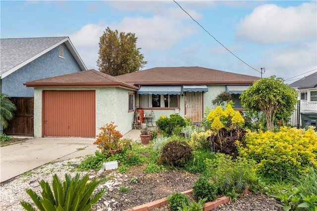 490 Crosby St, Altadena, CA 91001 - view of front of property featuring stucco siding, concrete driveway, fence, and a garage