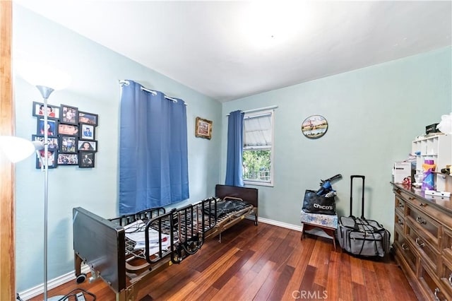 490 Crosby St, Altadena, CA 91001 - bedroom featuring baseboards and dark wood-type flooring