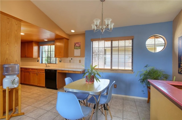 1268 Baden Ave, Grover Beach, CA 93433 - dining space featuring vaulted ceiling, light tile patterned floors, an inviting chandelier, baseboards, and recessed lighting