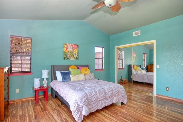 1268 Baden Ave, Grover Beach, CA 93433 - bedroom with a closet, wood finished floors, visible vents, and lofted ceiling
