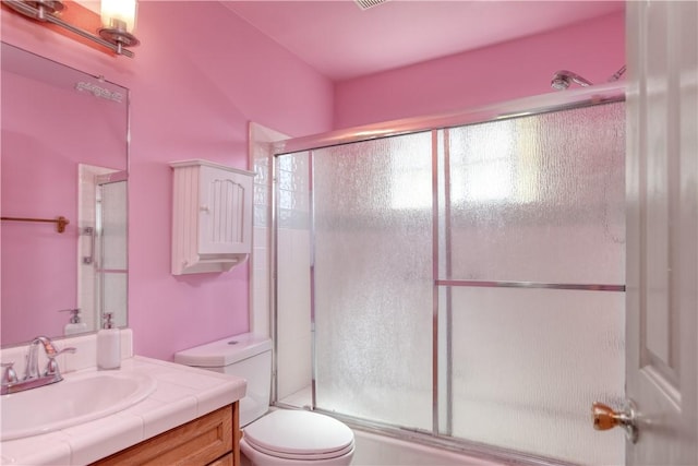 1268 Baden Ave, Grover Beach, CA 93433 - bathroom featuring vanity, a shower with shower door, and toilet