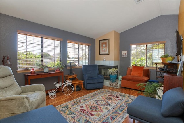 1268 Baden Ave, Grover Beach, CA 93433 - living area with lofted ceiling, a healthy amount of sunlight, and wood finished floors