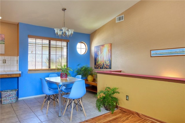 1268 Baden Ave, Grover Beach, CA 93433 - dining room featuring a chandelier, visible vents, and baseboards