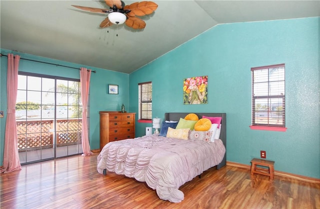 1268 Baden Ave, Grover Beach, CA 93433 - bedroom with multiple windows, vaulted ceiling, wood finished floors, and access to exterior