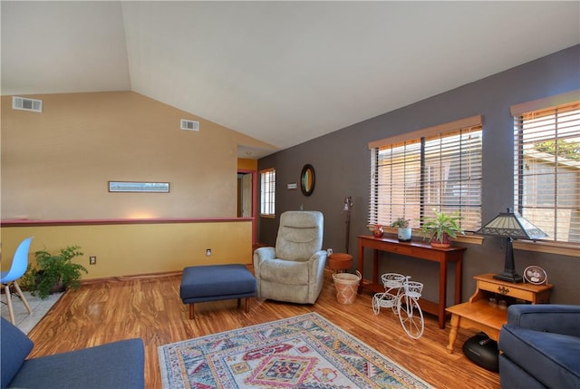 1268 Baden Ave, Grover Beach, CA 93433 - sitting room with plenty of natural light, wood finished floors, and visible vents