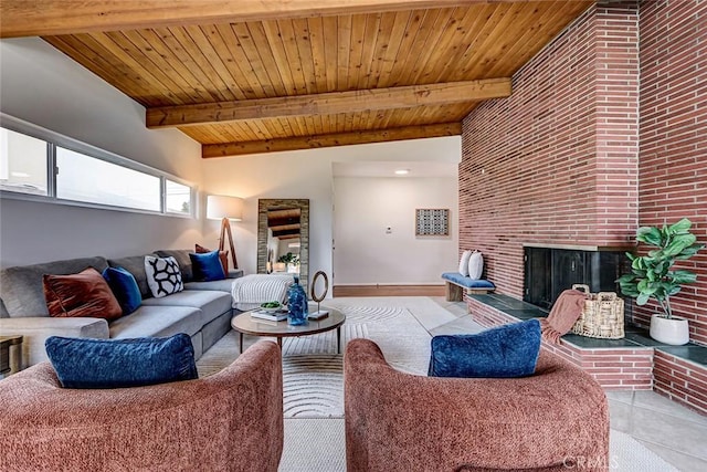 living area featuring wood ceiling, beamed ceiling, and light tile patterned floors