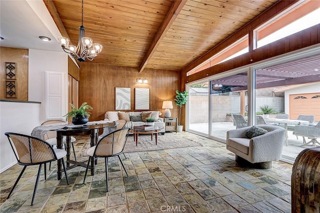 dining space with stone tile floors, wooden walls, wooden ceiling, beam ceiling, and a notable chandelier