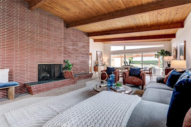 living area featuring tile patterned flooring, wooden ceiling, beam ceiling, and a fireplace