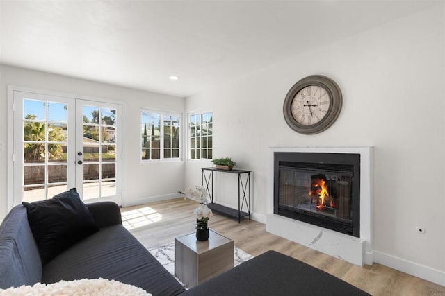 1194 Erin Dr, El Cajon, CA 92020 - living area with plenty of natural light, baseboards, and a glass covered fireplace