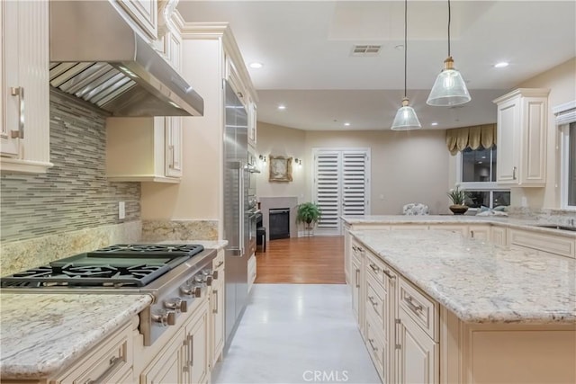 3499 Viewfield Ave, Hacienda Heights, CA 91745 - kitchen featuring stainless steel gas stovetop, under cabinet range hood, recessed lighting, and pendant lighting