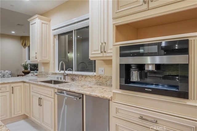 3499 Viewfield Ave, Hacienda Heights, CA 91745 - kitchen with cream cabinets, stainless steel appliances, a sink, and light stone countertops