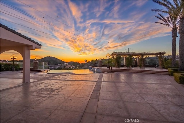3499 Viewfield Ave, Hacienda Heights, CA 91745 - patio terrace at dusk featuring a pergola