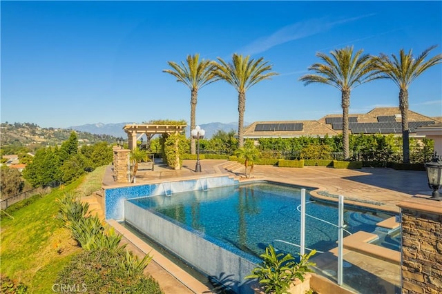 3499 Viewfield Ave, Hacienda Heights, CA 91745 - outdoor pool featuring a mountain view, fence, a patio area, and a pergola