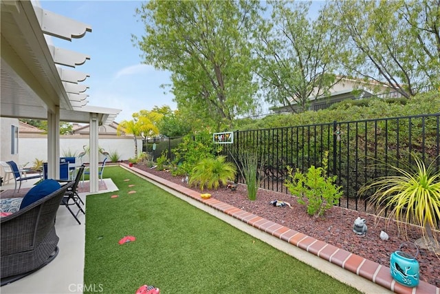 view of yard with a patio and a fenced backyard