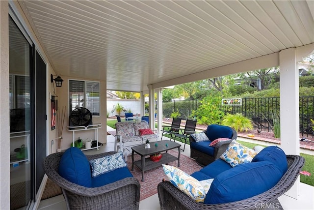 view of patio / terrace with an outdoor hangout area and a fenced backyard