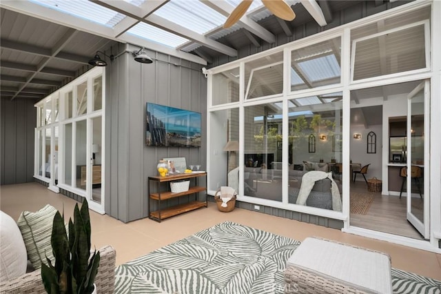 432 Seville Ave, Newport Beach, CA 92661 - sunroom featuring a skylight, beam ceiling, and ceiling fan