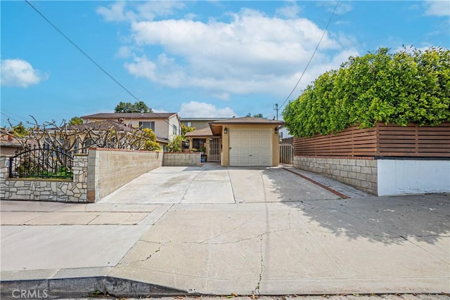 791 W 2nd St, San Pedro, CA 90731 - view of front of house with concrete driveway and an attached garage
