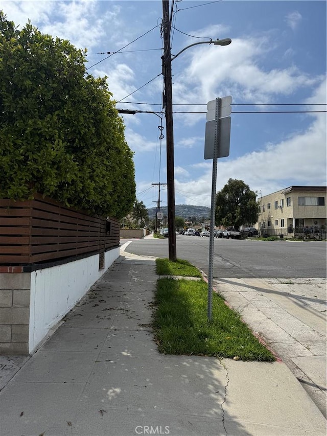 791 W 2nd St, San Pedro, CA 90731 - view of asphalt road featuring sidewalks and street lighting