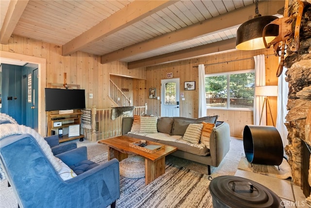 27979 N Bay Rd, Lake Arrowhead, CA 92352 - carpeted living room with wood ceiling, wood walls, beamed ceiling, and stairway