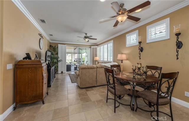 1765 Desert Poppy Ln, Beaumont, CA 92223 - dining space with crown molding, a ceiling fan, and baseboards