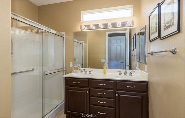 1765 Desert Poppy Ln, Beaumont, CA 92223 - bathroom featuring a shower stall and double vanity