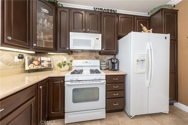 1765 Desert Poppy Ln, Beaumont, CA 92223 - kitchen featuring white appliances, dark brown cabinetry, light countertops, glass insert cabinets, and decorative backsplash
