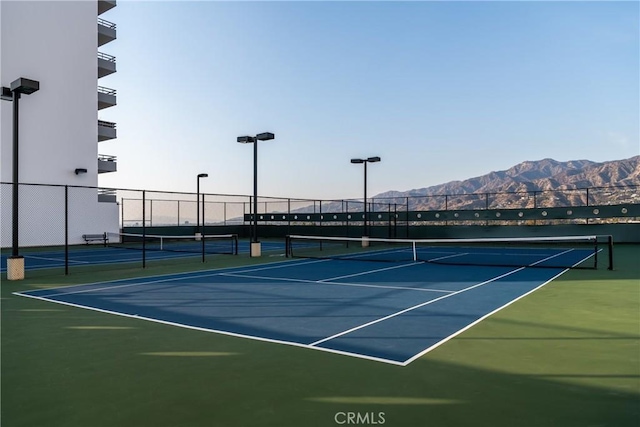 345 Pioneer Dr Unit 1705, Glendale, CA 91203 - view of tennis court featuring a mountain view and community basketball court